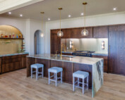 Modern Kitchen with dark brown cabinets